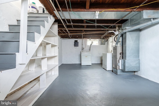 3788 Richmond St, Philadelphia, PA 19137 - basement with washer and dryer, heating unit, and stairway