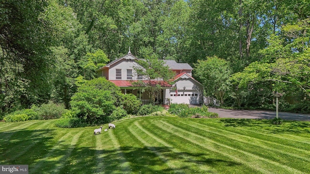 6813 Jeremiah Ct, Fairfax Station, VA 22039 - obstructed view of property featuring driveway and a front yard
