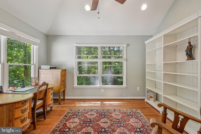 6813 Jeremiah Ct, Fairfax Station, VA 22039 - home office with vaulted ceiling, healthy amount of natural light, a ceiling fan, and wood finished floors