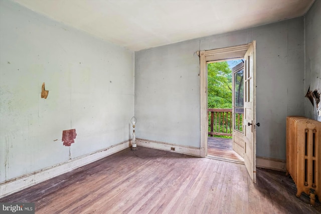 3101 Perry St, Mount Rainier, MD 20712 - empty room featuring radiator and wood finished floors
