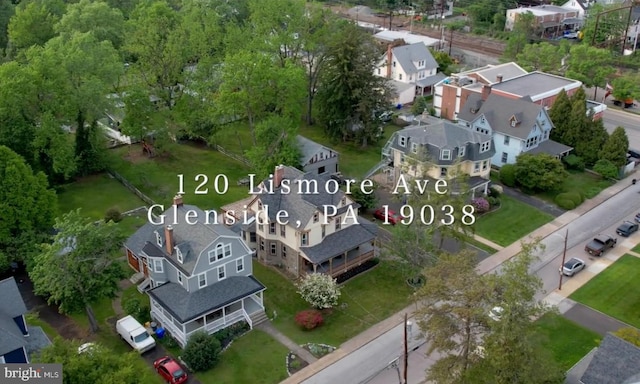 aerial overview of property's location featuring nearby suburban area