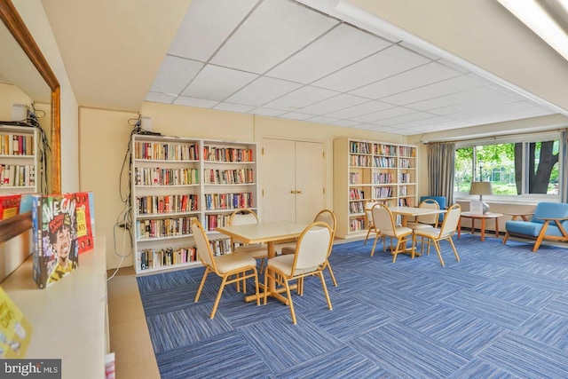 4201 Cathedral Ave NW Unit 415E, Washington, DC 20016 - carpeted dining room with built in shelves
