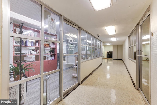 4201 Cathedral Ave NW Unit 415E, Washington, DC 20016 - corridor featuring tile patterned floors and baseboards