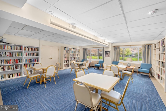 4201 Cathedral Ave NW Unit 415E, Washington, DC 20016 - carpeted dining room featuring a drop ceiling and built in features