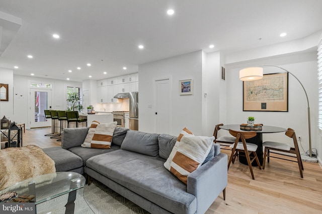 1440 Oak St NW Unit 1, Washington, DC 20010 - living room with recessed lighting and light wood-style floors