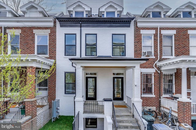 1440 Oak St NW Unit 1, Washington, DC 20010 - townhome / multi-family property with brick siding and cooling unit
