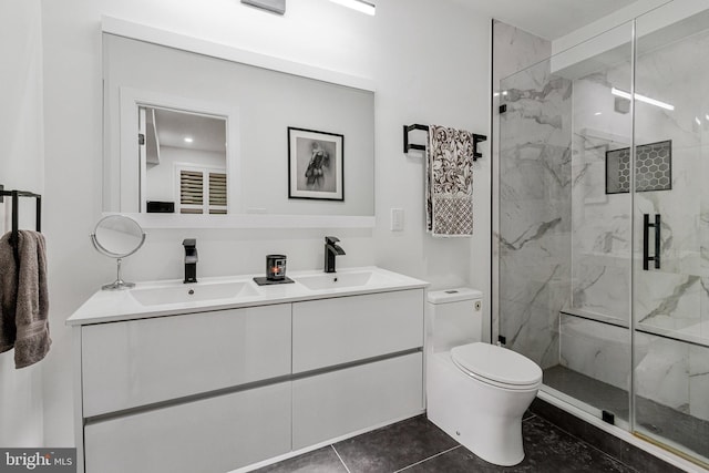 1440 Oak St NW Unit 1, Washington, DC 20010 - full bathroom with toilet, a marble finish shower, double vanity, and tile patterned flooring