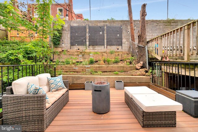 1440 Oak St NW Unit 1, Washington, DC 20010 - wooden deck with an outdoor living space and fence