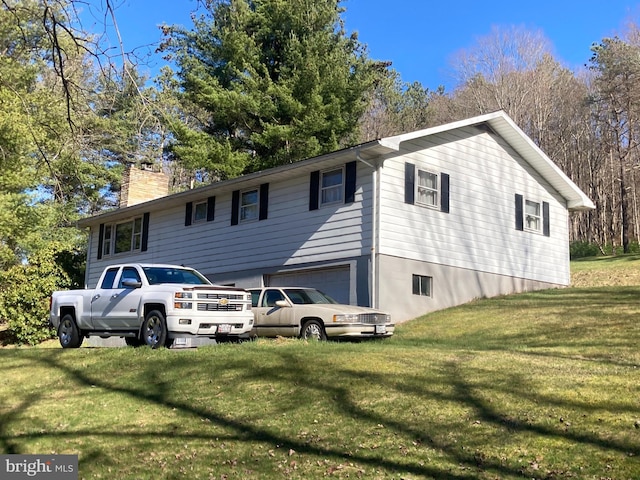 view of front of house featuring a chimney and a front yard
