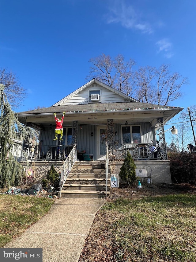 view of front of house with a porch and board and batten siding