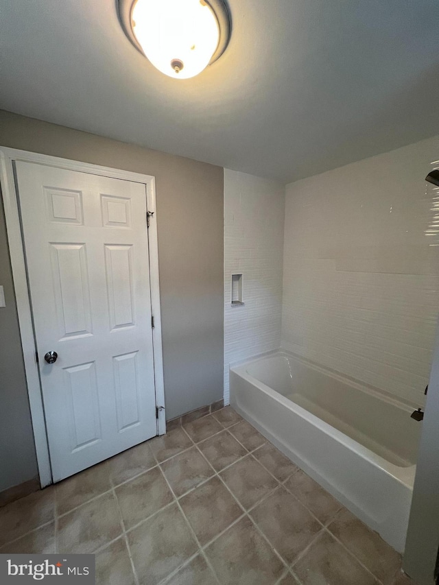 41 N Clinton Ave, Maple Shade, NJ 08052 - bathroom featuring a bathtub and tile patterned floors