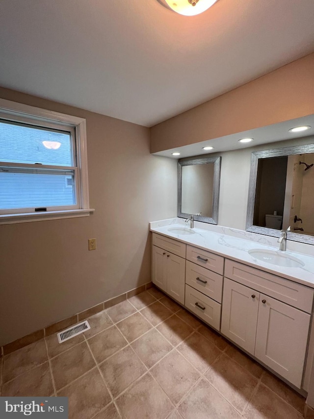 41 N Clinton Ave, Maple Shade, NJ 08052 - bathroom with double vanity and tile patterned flooring