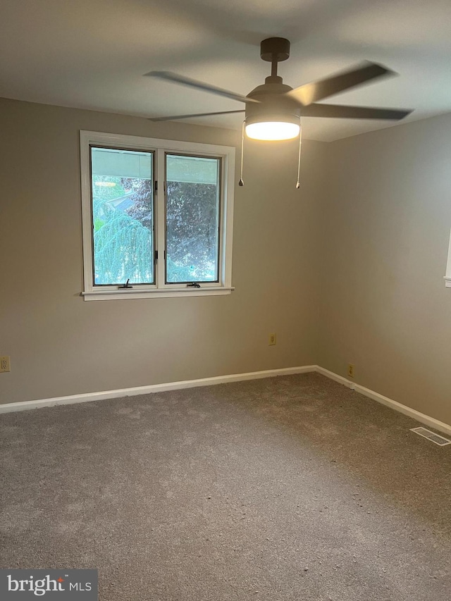 41 N Clinton Ave, Maple Shade, NJ 08052 - carpeted empty room with baseboards and a ceiling fan