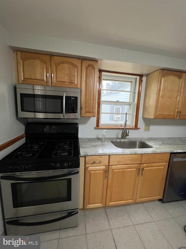 41 N Clinton Ave, Maple Shade, NJ 08052 - kitchen featuring stainless steel appliances, light tile patterned flooring, and light countertops