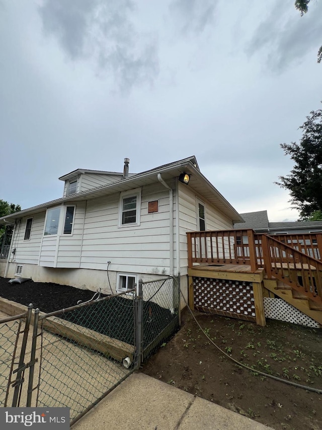 41 N Clinton Ave, Maple Shade, NJ 08052 - back of property featuring a deck and a gate