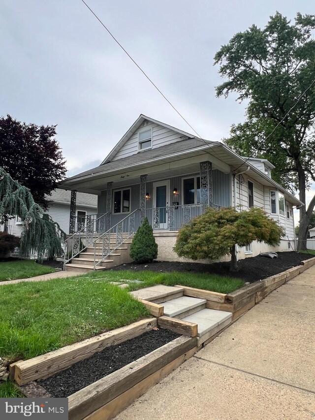 41 N Clinton Ave, Maple Shade, NJ 08052 - view of front facade with covered porch and a front yard