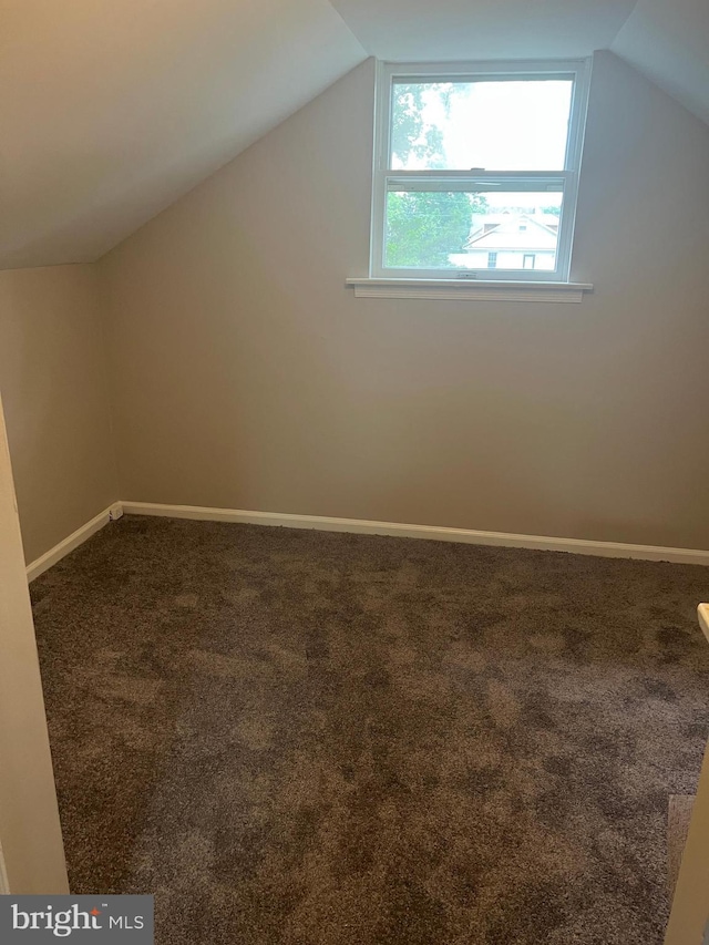 41 N Clinton Ave, Maple Shade, NJ 08052 - additional living space with vaulted ceiling and dark colored carpet
