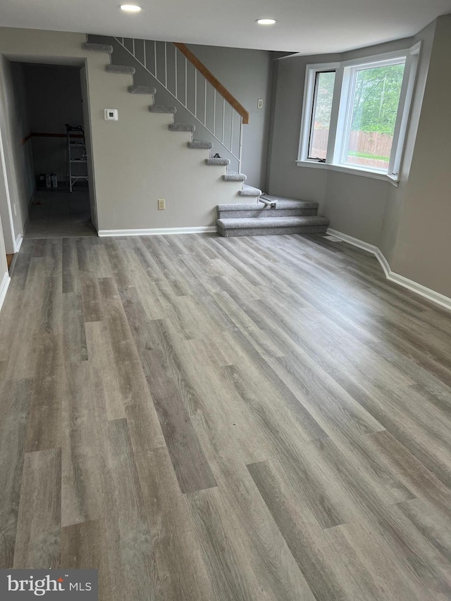 41 N Clinton Ave, Maple Shade, NJ 08052 - unfurnished living room featuring wood finished floors, stairway, and recessed lighting