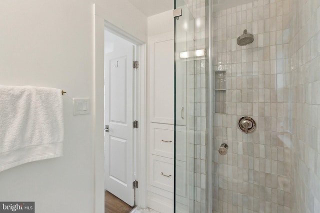 full bathroom with a shower stall