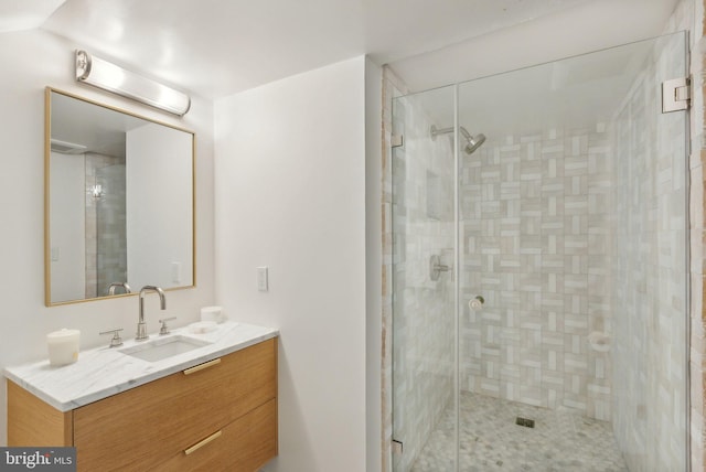 full bathroom with a wall mounted AC, a shower stall, and vanity