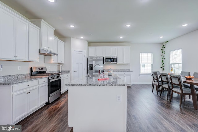 4801 Railway Cir, Monrovia, MD 21770 - kitchen with stainless steel appliances, under cabinet range hood, dark wood-style flooring, white cabinetry, and recessed lighting