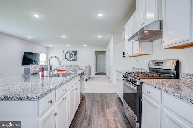 4801 Railway Cir, Monrovia, MD 21770 - kitchen with stainless steel appliances, under cabinet range hood, a sink, white cabinets, and open floor plan