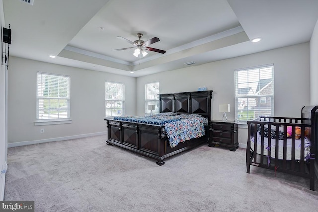 4801 Railway Cir, Monrovia, MD 21770 - carpeted bedroom featuring a raised ceiling, multiple windows, baseboards, recessed lighting, and a ceiling fan