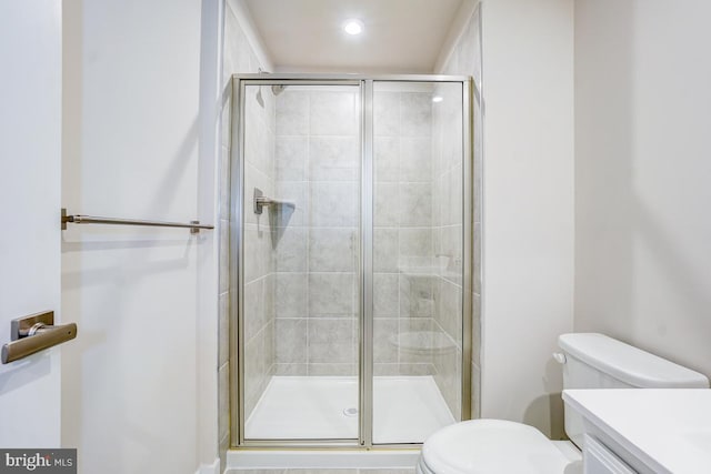 4801 Railway Cir, Monrovia, MD 21770 - bathroom with toilet, vanity, a shower stall, and recessed lighting