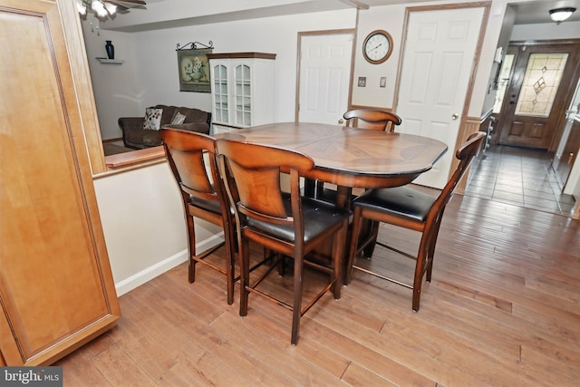 4361 Sutton Cir, Reading, PA 19606 - dining room with light wood-style floors, a ceiling fan, and baseboards