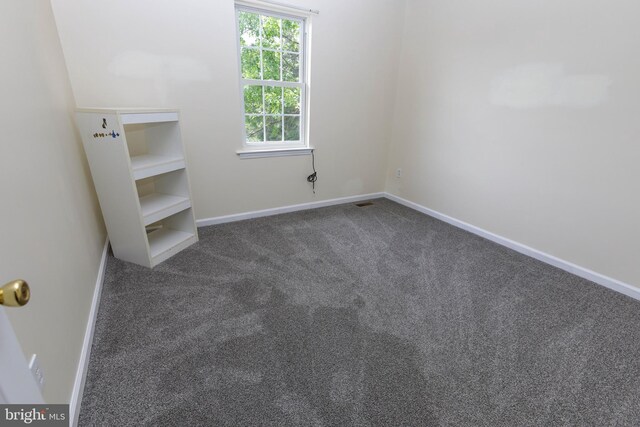 4361 Sutton Cir, Reading, PA 19606 - empty room featuring dark colored carpet and baseboards