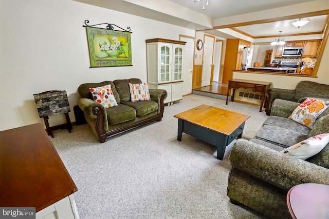 4361 Sutton Cir, Reading, PA 19606 - living area featuring light colored carpet, a tray ceiling, and baseboards