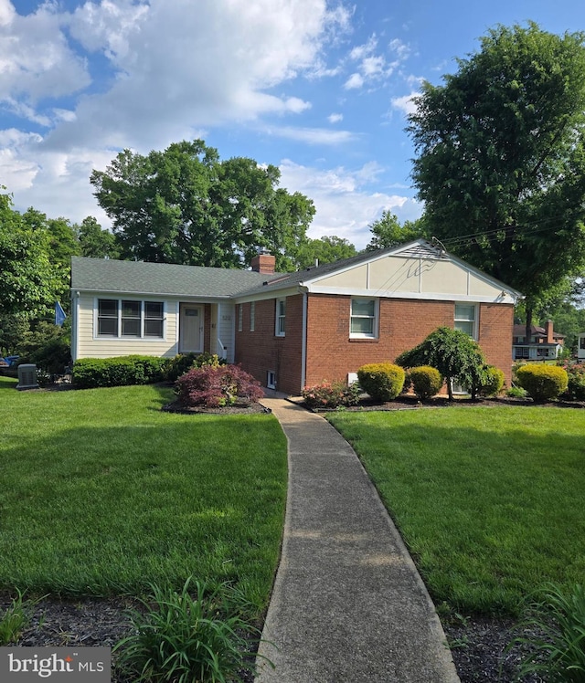 5212 Mount Vernon Memorial Hwy, Alexandria, VA 22309 - ranch-style house featuring a front lawn, a chimney, and brick siding