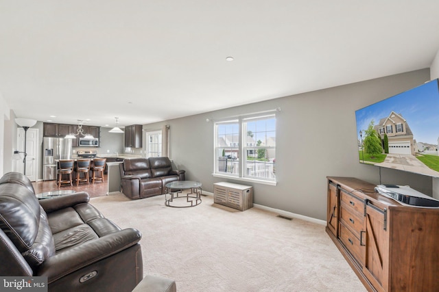 199 Colbert St, Taneytown, MD 21787 - living room featuring light colored carpet and baseboards