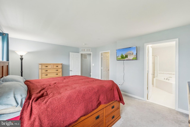 199 Colbert St, Taneytown, MD 21787 - bedroom with light carpet, baseboards, and ensuite bath