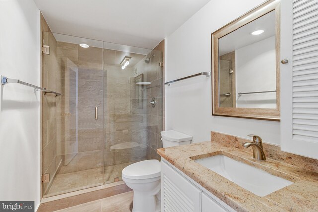 3800 Fairfax Dr Unit 1011, Arlington, VA 22203 - bathroom with toilet, a shower stall, and vanity
