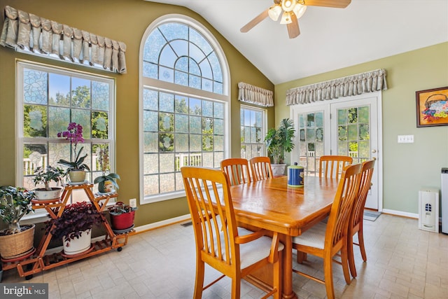 7229 Antares Dr, Gaithersburg, MD 20879 - dining room with ceiling fan, baseboards, and high vaulted ceiling