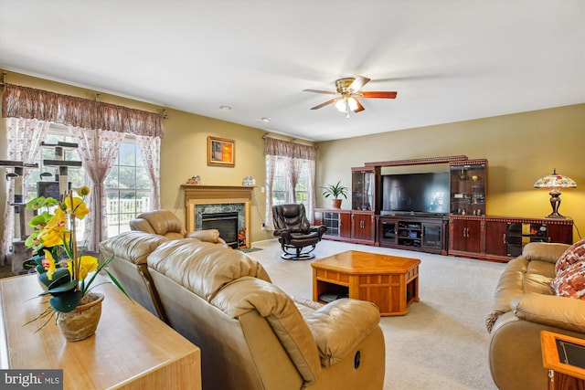 7229 Antares Dr, Gaithersburg, MD 20879 - living area with carpet floors, a ceiling fan, plenty of natural light, and a premium fireplace