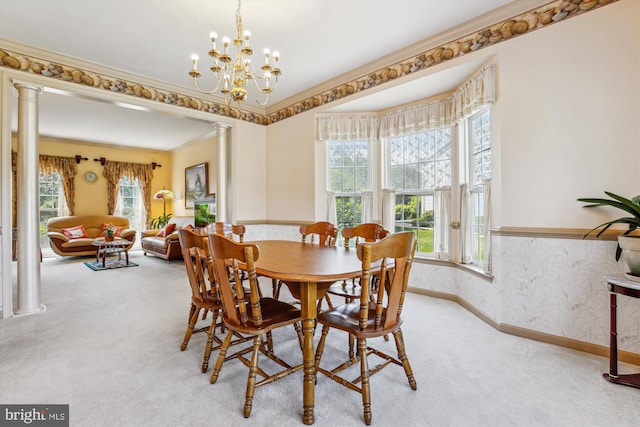 7229 Antares Dr, Gaithersburg, MD 20879 - dining area with decorative columns, light colored carpet, ornamental molding, wainscoting, and a chandelier