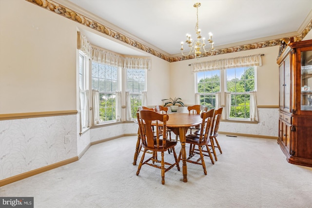 7229 Antares Dr, Gaithersburg, MD 20879 - dining area with a chandelier, baseboards, carpet flooring, and crown molding