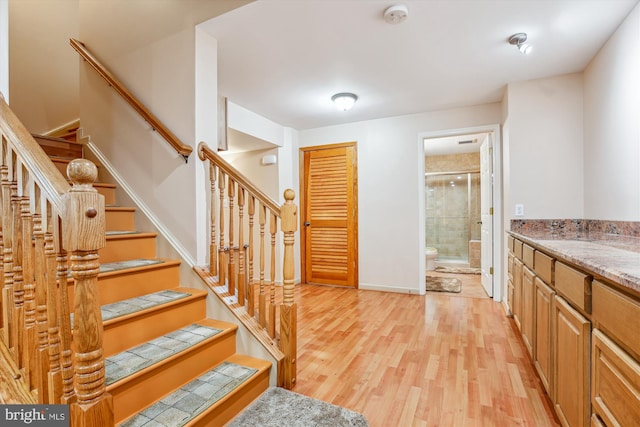 7229 Antares Dr, Gaithersburg, MD 20879 - stairway with wood finished floors and baseboards
