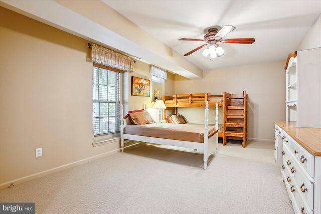 7229 Antares Dr, Gaithersburg, MD 20879 - bedroom with light carpet, baseboards, and a ceiling fan