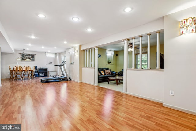 7229 Antares Dr, Gaithersburg, MD 20879 - exercise area featuring wood finished floors, recessed lighting, baseboards, and ornate columns