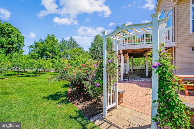 7229 Antares Dr, Gaithersburg, MD 20879 - view of grassy yard featuring a deck and a patio