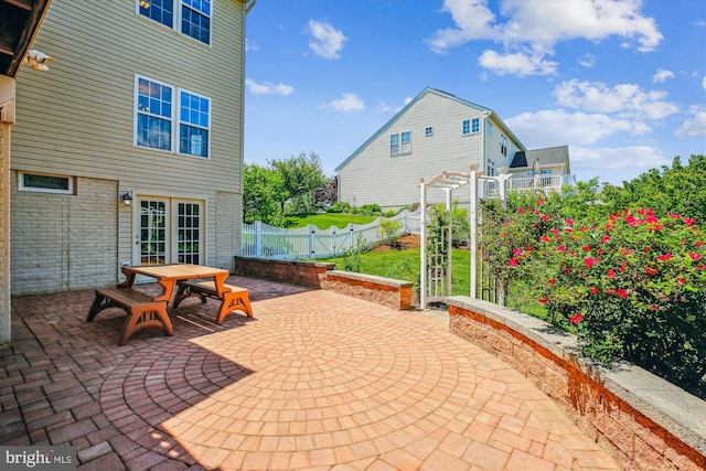 7229 Antares Dr, Gaithersburg, MD 20879 - fenced backyard with a patio, outdoor dining area, and a pergola