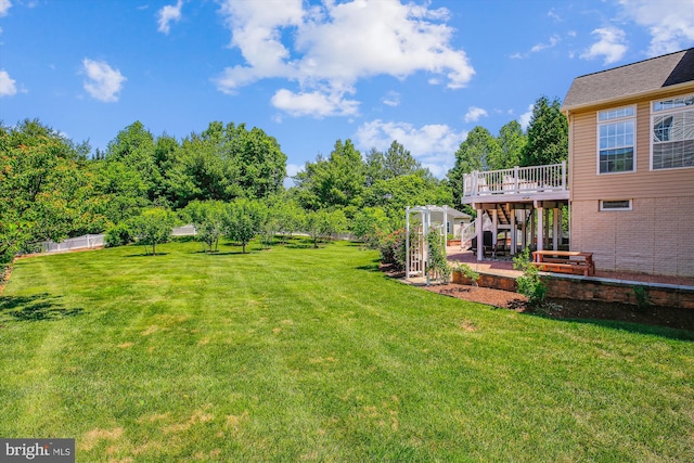 7229 Antares Dr, Gaithersburg, MD 20879 - view of green lawn with a patio area and a deck