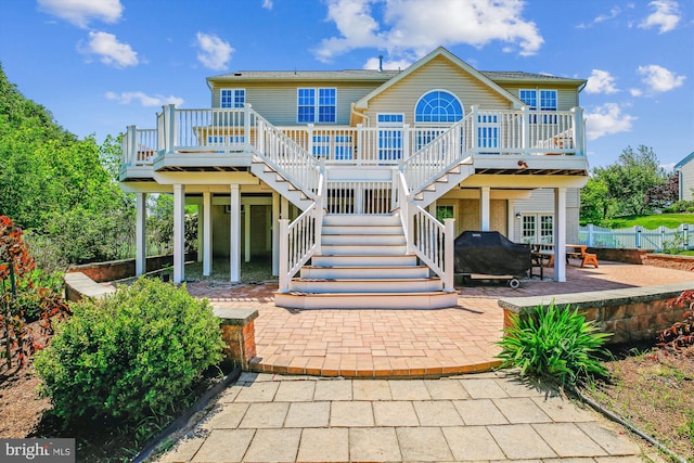 7229 Antares Dr, Gaithersburg, MD 20879 - rear view of property with a deck, a patio, and stairway