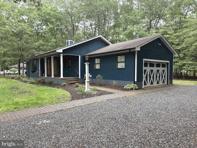 5 Kent Ave, Ocean View, DE 19970 - view of front facade featuring covered porch and view of wooded area