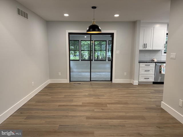 5 Kent Ave, Ocean View, DE 19970 - unfurnished dining area featuring baseboards, recessed lighting, and wood finished floors