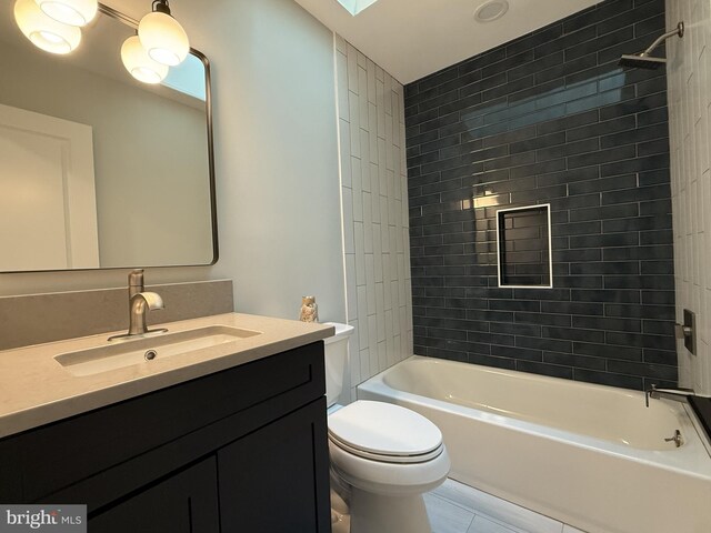 5 Kent Ave, Ocean View, DE 19970 - bathroom with vanity, toilet,  shower combination, and tile patterned flooring