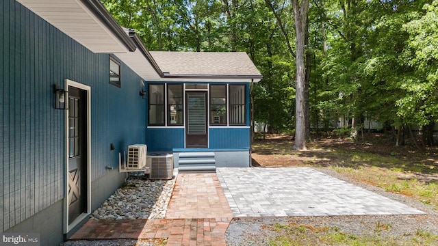 5 Kent Ave, Ocean View, DE 19970 - view of patio featuring a sunroom, central AC unit, and ac unit
